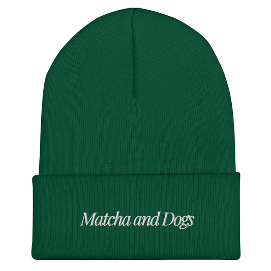 Green beanie with 'Matcha and Dogs' text on a white background