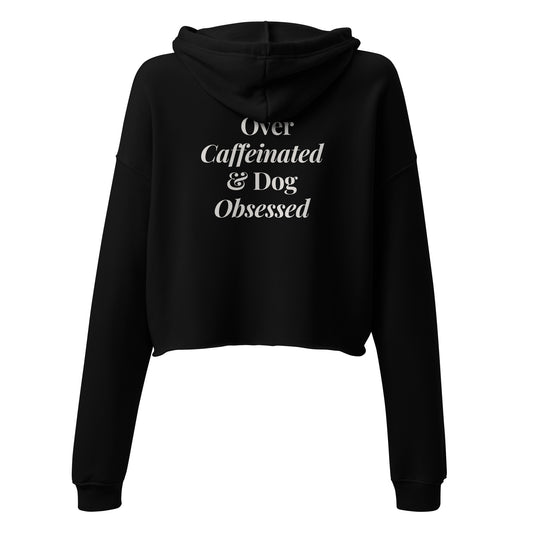 Black hoodie with text 'Over Caffeinated & Dog Obsessed' on a white background
